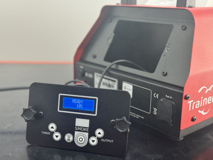 301 Trainer smoke machine with detachable control panel featuring display and adjustable timer, smoke, and output settings.